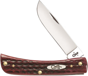 Case XX USA - Sod Buster Jr Old Red Bone CA10304  Pocket Worn. 6137 SS pattern. 3.63" closed. Mirror finish stainless skinner blade. Old Red jigged bone handle. Nickel silver bolster(s). Inlay shield. Boxed. 021205103044